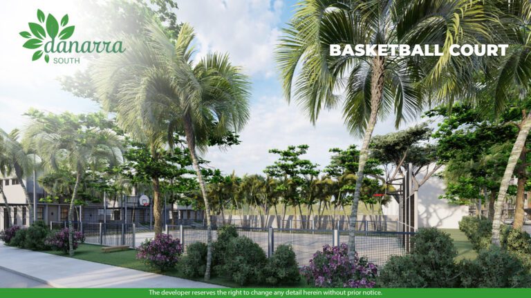 Lush basketball court surrounded by tropical greenery, providing a serene yet energizing space for sports and relaxation within Danarra South.