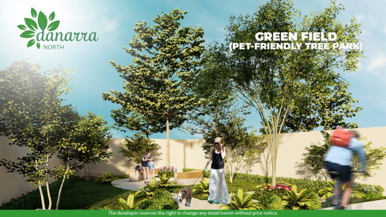 Artist's perspective of Danarra North's Green Field, a pet-friendly tree park with shaded seating areas, vibrant greenery, and residents enjoying leisure time walking dogs and relaxing in the serene environment.